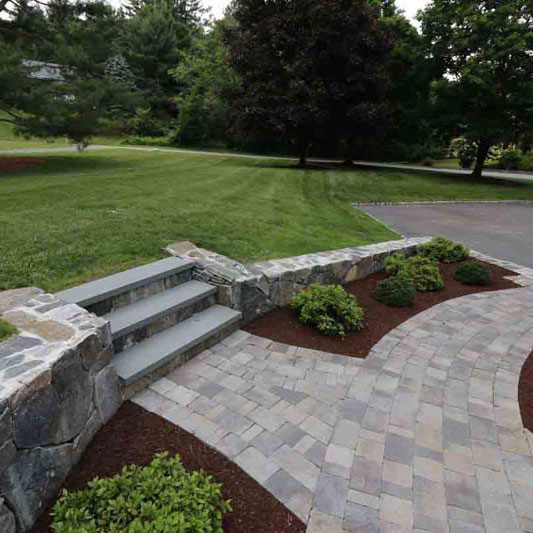 steps and walkway with landscaping
